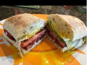 A picture of sandwich and fried eggs