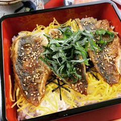 A picture of Horse Mackerel Kabayaki on Rice Packed with Umami Taste of Shiitake Powder.