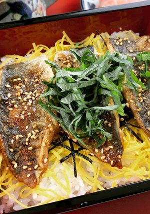 A picture of Horse Mackerel Kabayaki on Rice Packed with Umami Taste of Shiitake Powder.