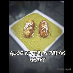 Aloo kofta in palak gravy A picture of Aloo kofta in palak gravy.