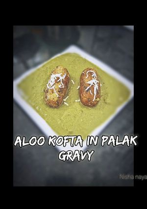 A picture of Aloo kofta in palak gravy.