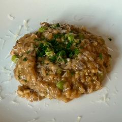 A picture of Mushroom Risotto with Peas.