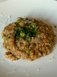 A picture of Mushroom Risotto with Peas.