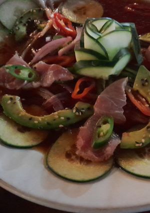 Una foto de Sashimi de jurel