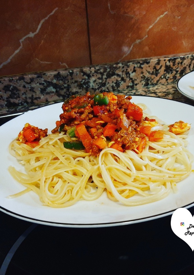 Una foto de Espaguetis a la Bolognesa