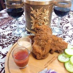 A picture of Al-BAIK CHICKEN.
