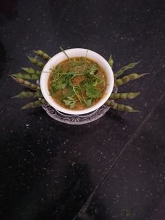 तुरीच्या हीरव्या दान्याची आमटी रेसिपी (toorichya danyachi amti recipe in marathi) रेसिपी चे मुख्य फोटो