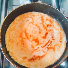 A picture of Fried Eggs​ with Milk.