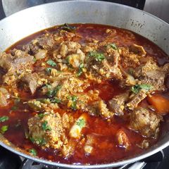 A picture of Maharashtrian Style Mutton Rassa.