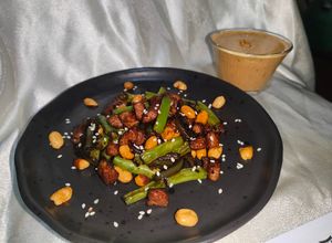 Una foto de Cerdo en salsa satay