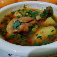 A picture of Chicken aloo mater.