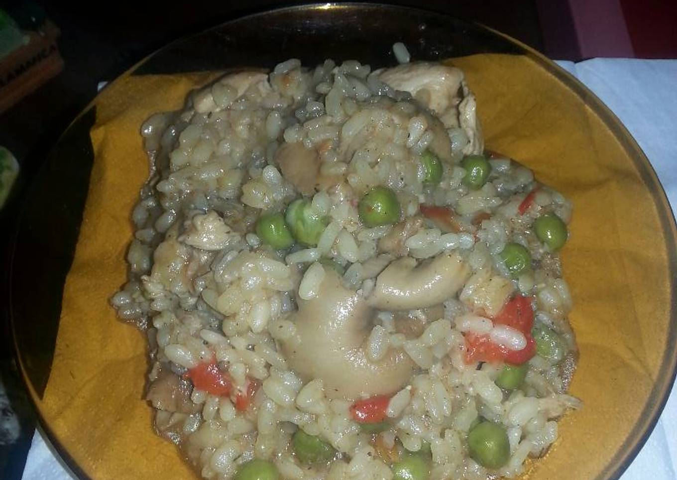 Arroz con pollo setas y guisantes