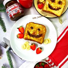A picture of Nutella French Toast with strawberries.