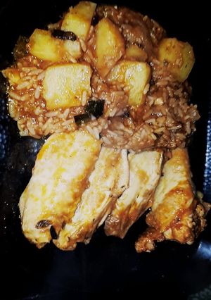Una foto de Alitas De Pollo Con Arroz