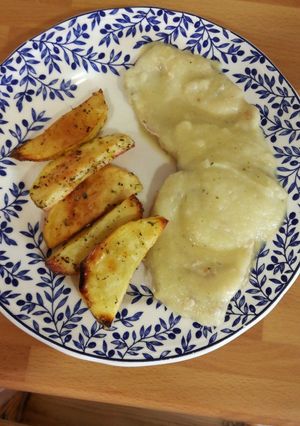 Una foto de Filetes lomo con manzana en compota