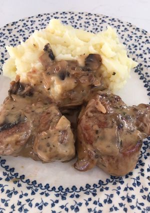 A picture of Pork medallions in mushroom Marsala sauce.