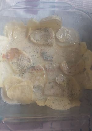 Una foto de Papas con queso y crema al microondas (salsa de queso)