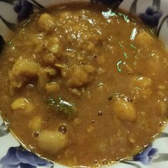 A picture of Sambar Chole Potato Curry.