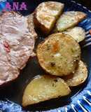 Bondiola de cerdo mechada con papas al horno
