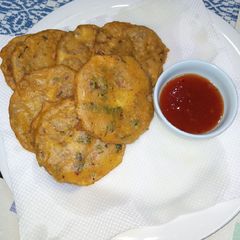 A picture of Brinjal Tikki Fritters.