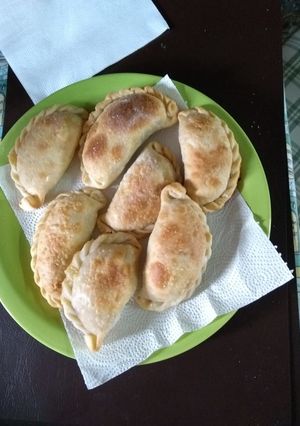 Una foto de Empanadas de cebolla y queso