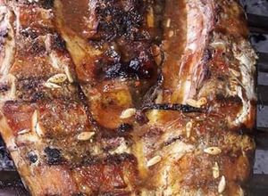 Una foto de Asado a la parrilla de boga simple y bien dorada