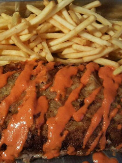 Una foto de Cachopo de jamón con salsa de pimientos