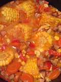 Guiso de maíz con vegetales y jamón en olla a presión