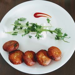 Potato paneer poppers- (coconut and cashew stuffed) A picture of Potato paneer poppers- (coconut and cashew stuffed).