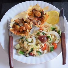 A picture of Chicken/veggie baskets.
