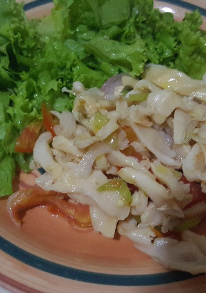 Una foto de Filete de lambi a la vinagreta