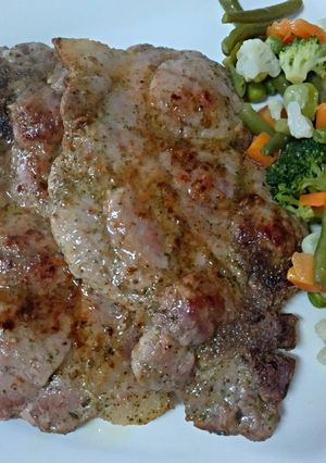 Una foto de Chuletas de cabecero de lomo 🐷 adobada