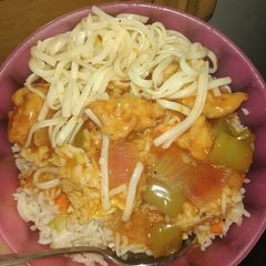 A picture of Chicken jalfarezi with fried rice.