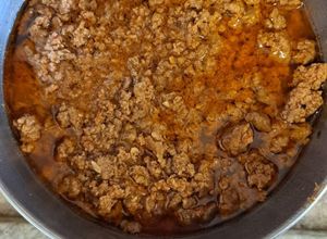 Foto de Preparação base de carne moída com molho de tomate