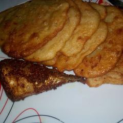 A picture of Pan cake and fried fish.