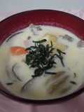 Pork miso soup with mushrooms and milk