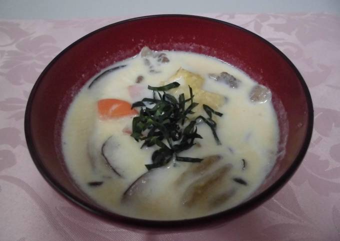 Pork miso soup with mushrooms and milk