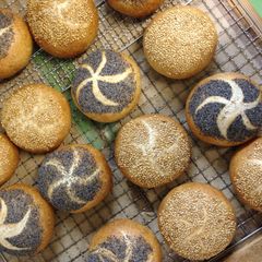 A picture of Sesame & Poppy Kaiser Rolls (Kaisersemmel) with Skim Milk.