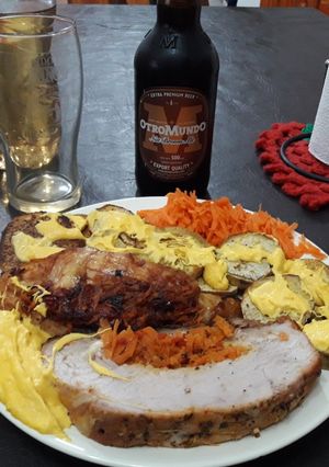 Una foto de Nalga de cerdo rellena con papas y cheddar