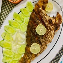 A picture of Red Snapper in tikka masala.