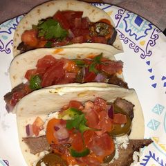 A picture of Braised beef brisket tacos.