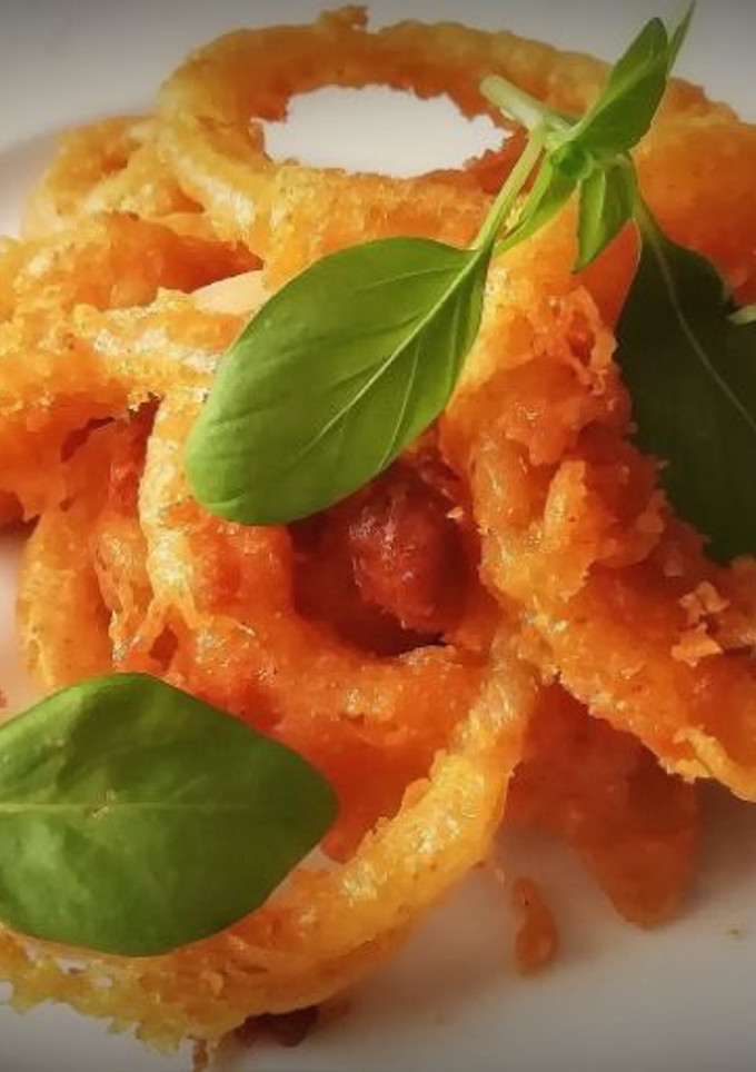 Una foto de Aros de cebolla en tempura