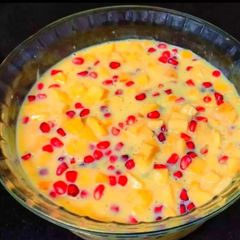 A picture of Mango, pomegranate custard.