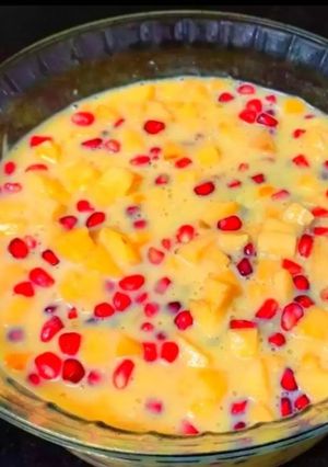 A picture of Mango, pomegranate custard.