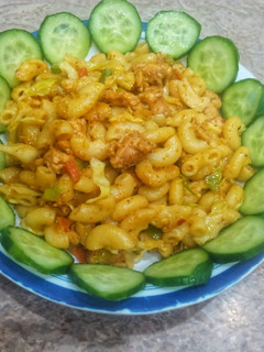 A picture of Chicken tikka macroni.