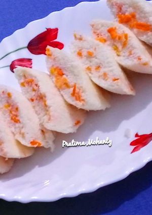 A picture of Carrot Stuffed Idli.