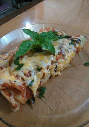 Una foto de Canelones de carne con salsa pomodoro a los 4 queso