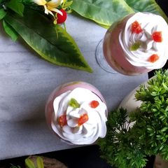 A picture of Strawberry fruit custard 🍓🍌🍏🍧🍨.