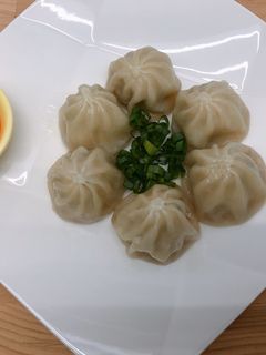 A picture of Delicious Pan-Fried Juicy Soup Dumplings.
