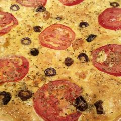A picture of Tomato, olive and feta quiche.